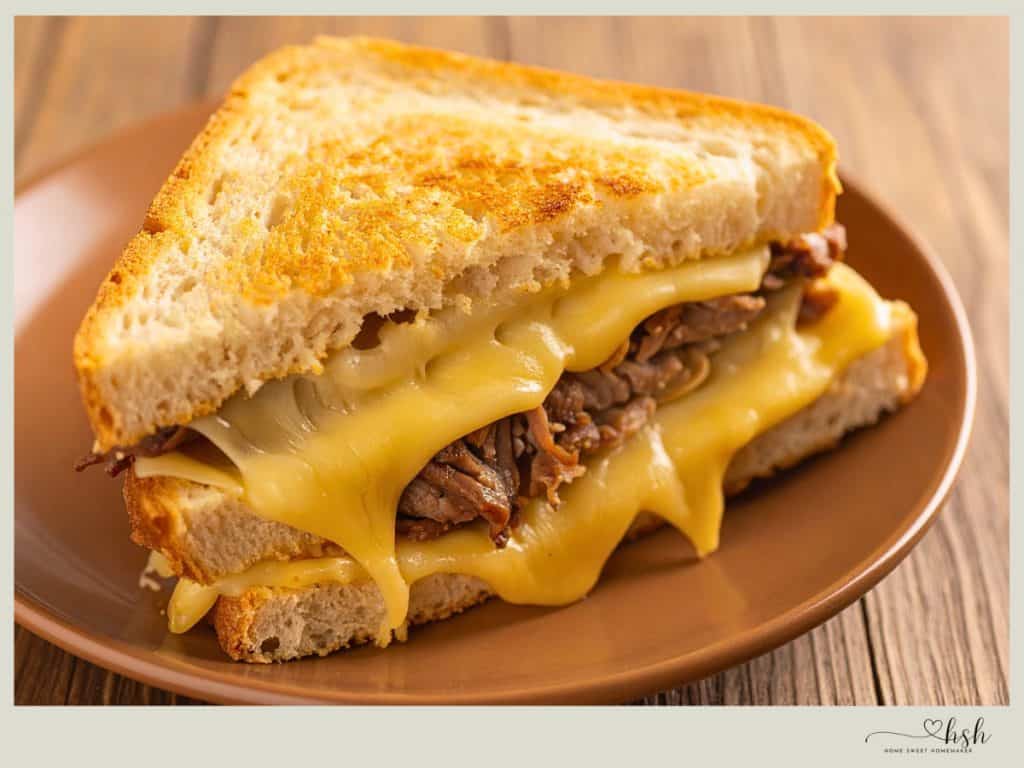 Leftover Beef Brisket Recipes That Turn Yesterday’s Dinner Into Something New 6 Gooey grilled cheese sandwich stuffed with leftover beef brisket and melted cheddar on toasted sourdough