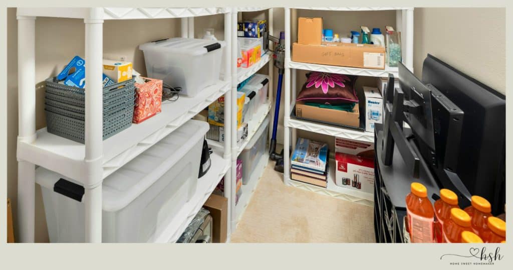 Your Complete Post-Holiday Home Reset Guide 7 White shelving units filled with organized bins and household supplies to complete a functional post-holiday home reset.